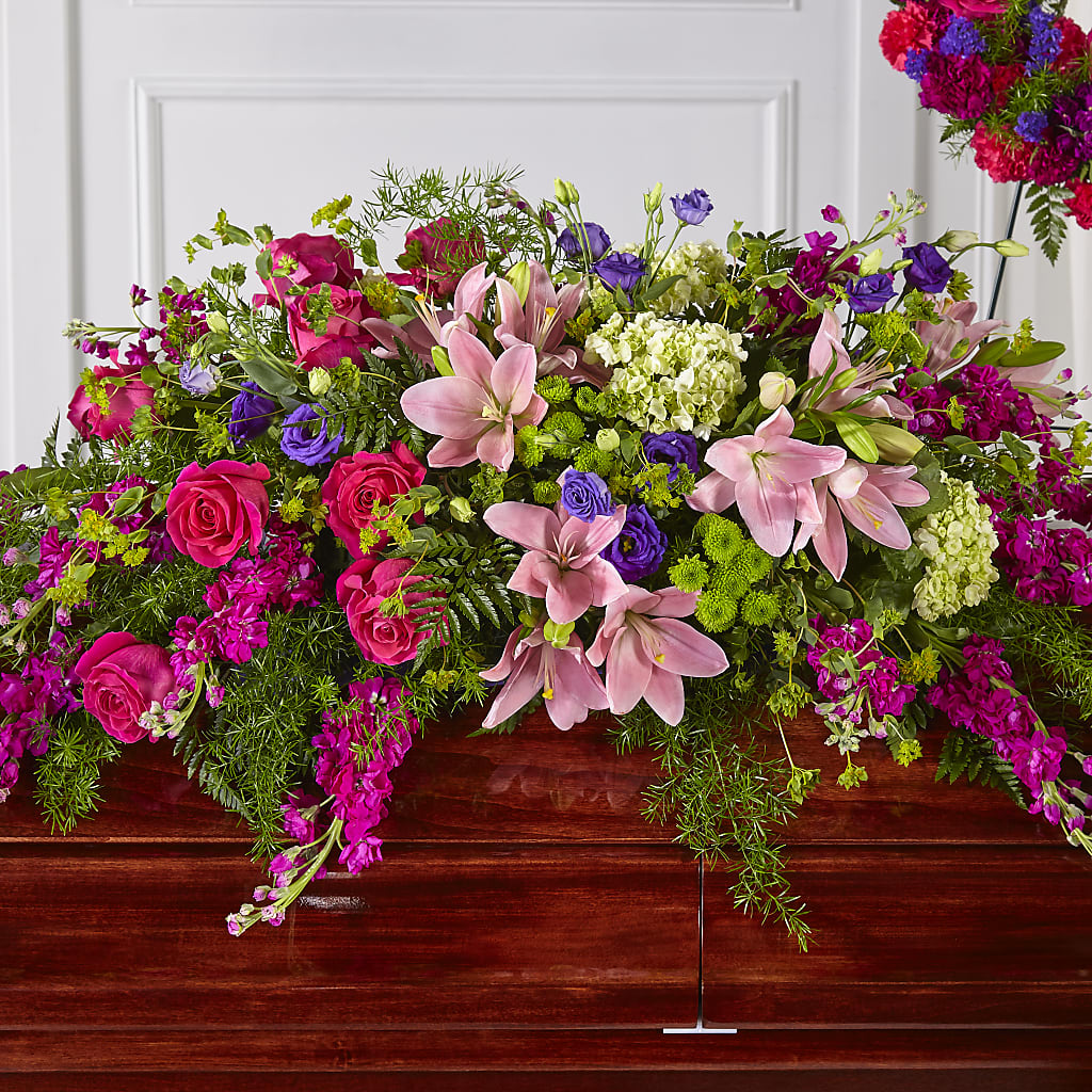 Radiant Tribute Casket Spray – COBORN'S INC FLORAL SHOPPES, Saint Cloud MN